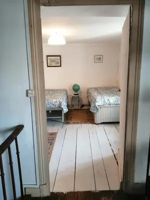 Coin salon dans l'établissement Grande maison de ville avec jardin Valence en Poitou pour 8 à 14 personnes