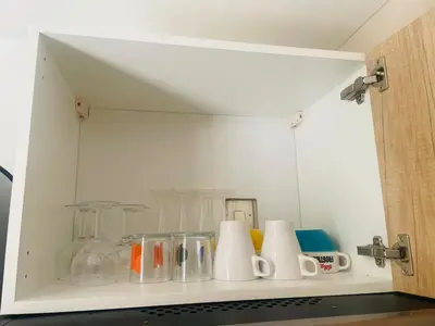 Cuisine ou kitchenette dans l'établissement Charmante petite maison avec jardin et parking-Niort Centre
