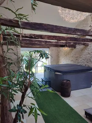 Jardin de l'établissement Maison de vacances 12 personnes Champniers