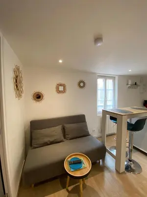 Coin salon dans l'établissement Appartement calme à Saint Maixent l'Ecole