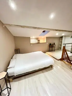 Un ou plusieurs lits dans un hébergement de l'établissement Le cosy duplex de l'Isle d'Espagnac