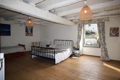 Un ou plusieurs lits dans un hébergement de l'établissement Charente Cozy Family Winter Retreat