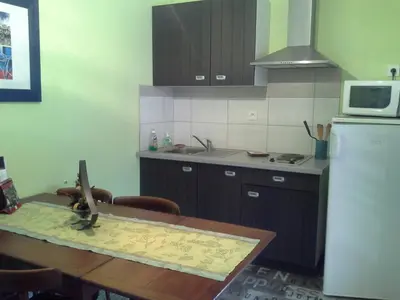 Cuisine ou kitchenette dans l'établissement Le Logis Du Four