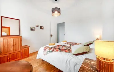 Un ou plusieurs lits dans un hébergement de l'établissement Cozy Home In Touvre With Wifi