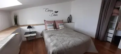 Un ou plusieurs lits dans un hébergement de l'établissement Maison confortable 8 personnes - 4 chambres -