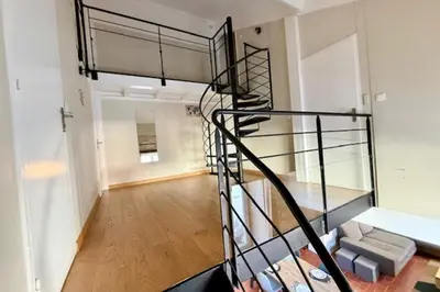 Un ou plusieurs lits dans un hébergement de l'établissement Bright triplex in the heart of La Rochelle