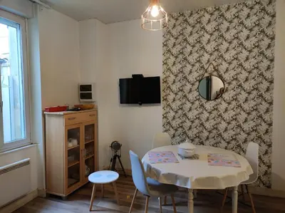 Télévision ou salle de divertissement dans l'établissement appartement Zéphyr