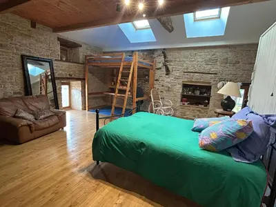 Un ou plusieurs lits dans un hébergement de l'établissement Maison de campagne