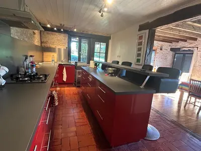 Cuisine ou kitchenette dans l'établissement Maison de campagne
