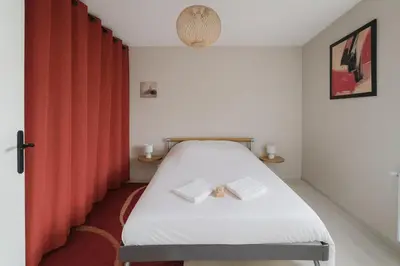 Un ou plusieurs lits dans un hébergement de l'établissement Maison Chardonnerets - Poitiers