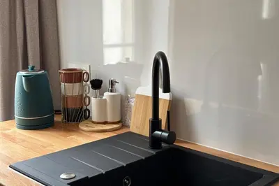 Cuisine ou kitchenette dans l'établissement La parenthèse