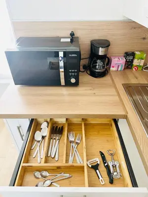 Cuisine ou kitchenette dans l'établissement Premium T2 centre ville, 15 min futuroscope