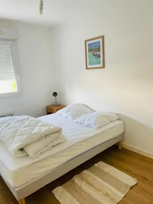 Un ou plusieurs lits dans un hébergement de l'établissement Appartement RDC meublé avec 2 chambres