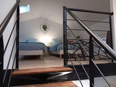 Un ou plusieurs lits dans un hébergement de l'établissement L'escale familiale Gite le cosy pour 6 personnes
