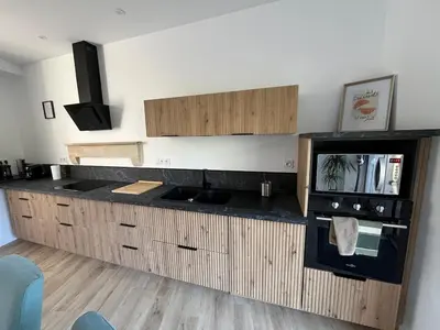 Cuisine ou kitchenette dans l'établissement La maison du viaduc