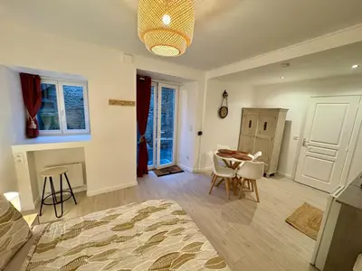 Coin salon dans l'établissement Studio cozy et fonctionnel au cœur de Mansle