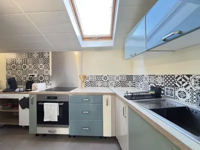 Cuisine ou kitchenette dans l'établissement Maison Cosy & Colorée à Valence-en-Poitou Jardin & Parking
