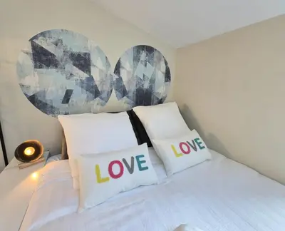 Un ou plusieurs lits dans un hébergement de l'établissement L'Aquarelle studio - Bord du Clain, Calme, Netflix