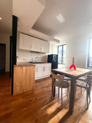 Cuisine ou kitchenette dans l'établissement l'Appartement de Tintin