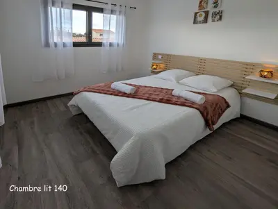 Un ou plusieurs lits dans un hébergement de l'établissement home family