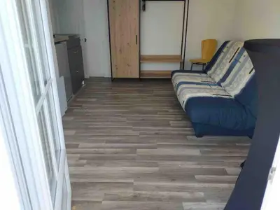 Coin salon dans l'établissement Le 14 maison familiale entre terre et mer