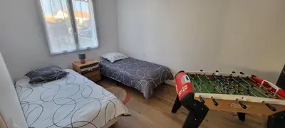 Un ou plusieurs lits dans un hébergement de l'établissement La maison du saule