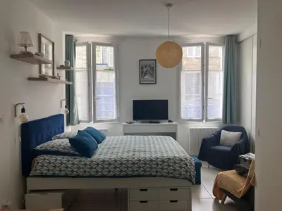 Un ou plusieurs lits dans un hébergement de l'établissement Centre ville studio meublé de tourisme classé 2 étoiles
