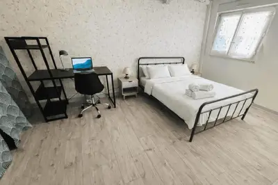 Un ou plusieurs lits dans un hébergement de l'établissement Maison idéalement située à La Rochelle