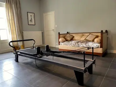 Un ou plusieurs lits dans un hébergement de l'établissement La Maison du Petit Jacques - Rose Cottage