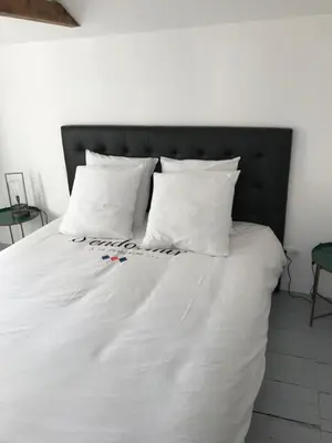Un ou plusieurs lits dans un hébergement de l'établissement La maison de yann