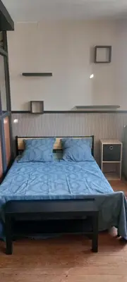 Un ou plusieurs lits dans un hébergement de l'établissement Appartement C - Centre PONS