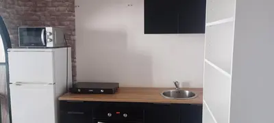 Cuisine ou kitchenette dans l'établissement Appartement C - Centre PONS