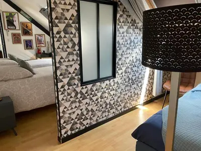 Coin salon dans l'établissement Les chambres du Bocage - Chambre Marylin