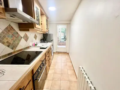 Cuisine ou kitchenette dans l'établissement Cocon au Cœur de Ville avec Cour - Poitiers Centre