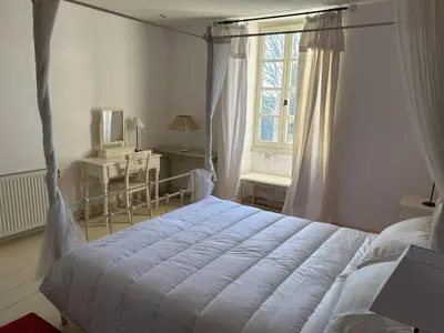 Un ou plusieurs lits dans un hébergement de l'établissement Gite maison charentaise - piscine privée
