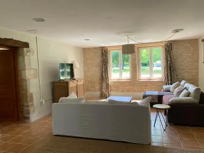 Coin salon dans l'établissement Les Champs De L'oume