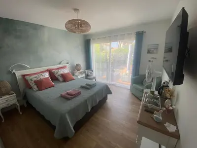 Un ou plusieurs lits dans un hébergement de l'établissement La Note Bleue - Chambres d'hôtes