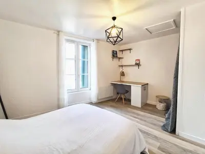 Un ou plusieurs lits dans un hébergement de l'établissement La Chaume, jolie appartement à Poitiers