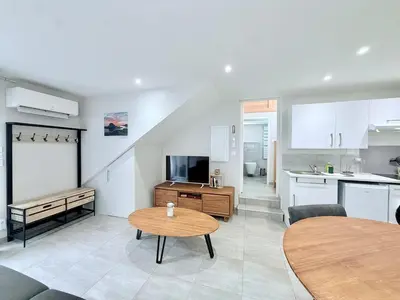 Cuisine ou kitchenette dans l'établissement Le Bord de Plage