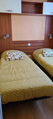 Un ou plusieurs lits dans un hébergement de l'établissement mobil home 4P proche du futuroscope