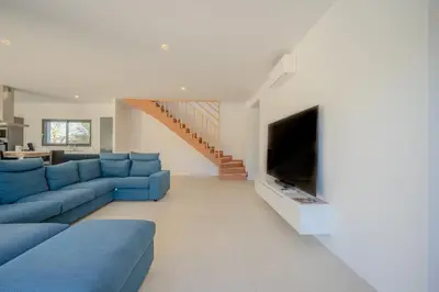 Télévision ou salle de divertissement dans l'établissement Villa Solis