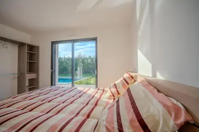 Un ou plusieurs lits dans un hébergement de l'établissement Villa Solis