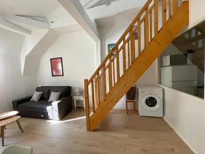 Coin salon dans l'établissement Le Saudade - Superbe Duplex au Coeur du Port