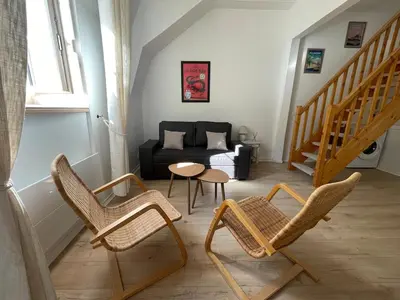 Coin salon dans l'établissement Le Saudade - Superbe Duplex au Coeur du Port
