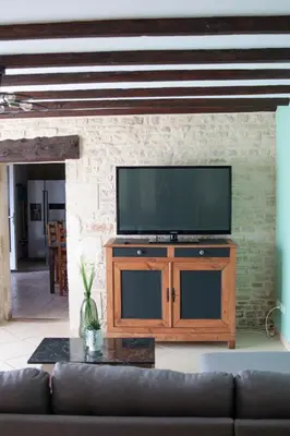 Télévision ou salle de divertissement dans l'établissement Gîte des forgerons