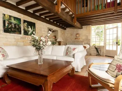 Coin salon dans l'établissement Holiday Home Le Petit Moulin - Feriendomizil mit beheiztem Pool by Interhome