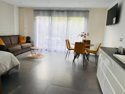 Coin salon dans l'établissement NovaVilla