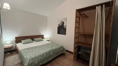 Un ou plusieurs lits dans un hébergement de l'établissement L'Annexe, Maison avec jardin proche Futuroscope