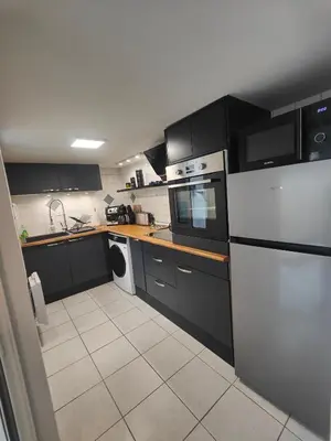 Cuisine ou kitchenette dans l'établissement Le Liseo - Terrasse, véranda au cœur du centre ville
