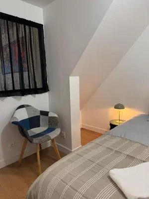 Un ou plusieurs lits dans un hébergement de l'établissement Logement 11 parking gratuit